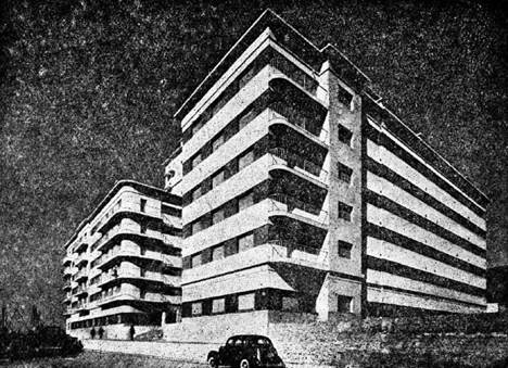 Imagen en blanco y negro de un edificio

Descripción generada automáticamente con confianza media