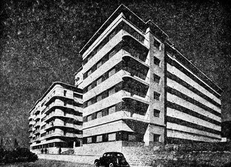 Imagen en blanco y negro de un edificio
Descripción generada automáticamente con confianza media